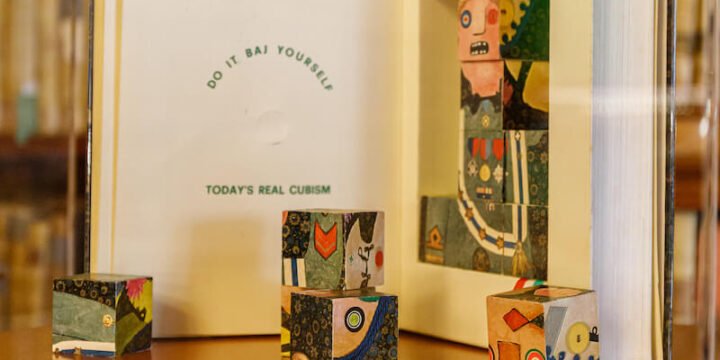 Un'opera di Enrico Baj esposta alla mostra "Baj. Libri in libertà" alla Biblioteca Braidense di Milano